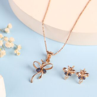Elegant Bow Design Set In Gold And Blue Stone